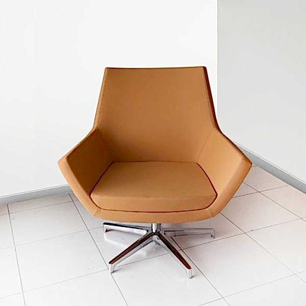 armchair, characterized by a mesmerizing geometric pattern that adds depth and visual interest.