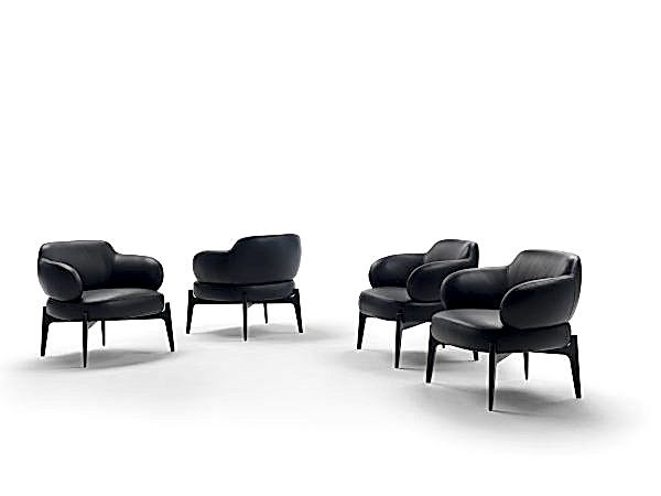 armchair on legs, a fusion of art and comfort.
