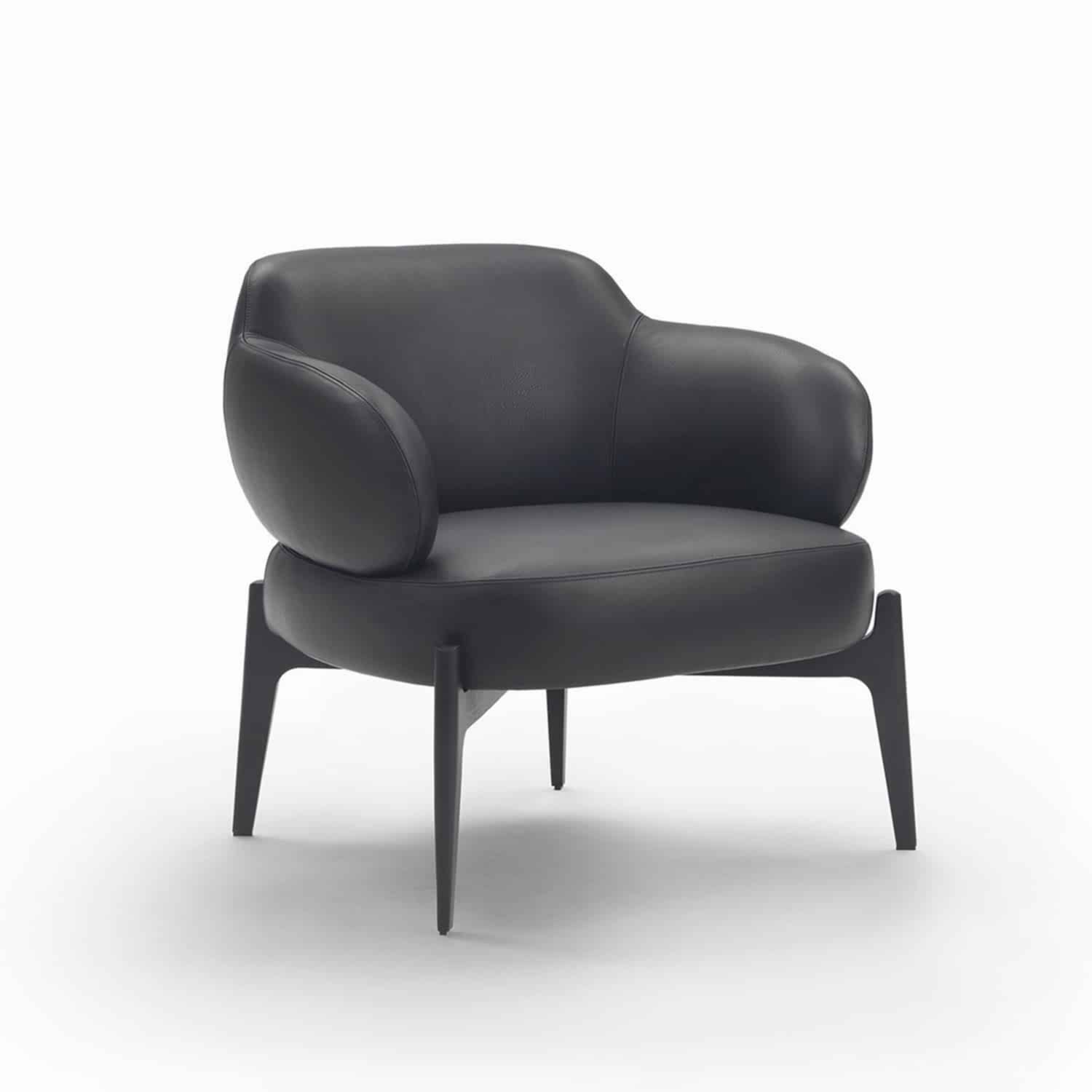 armchair, resting elegantly on its legs.