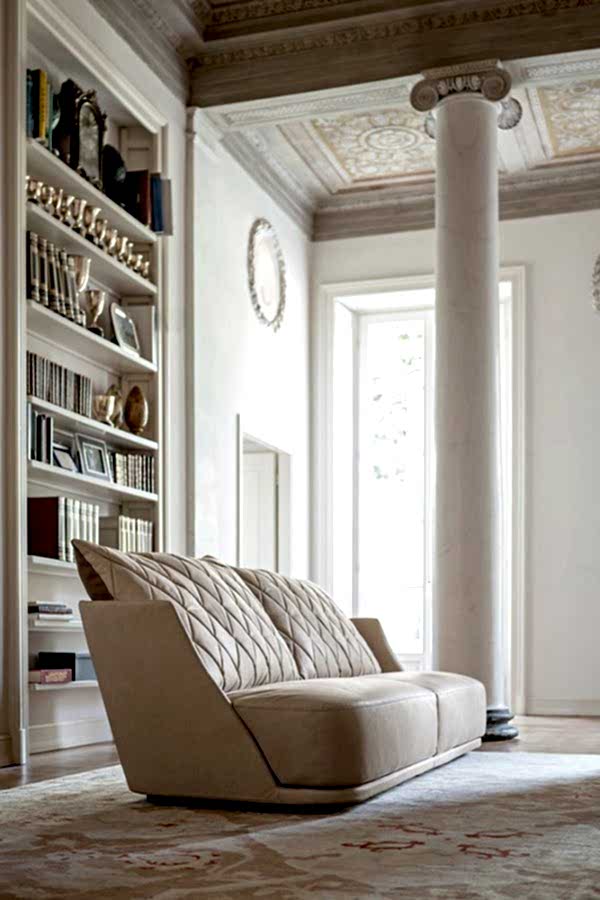 Sink into comfort with the plush cushions and impeccable detailing of this luxury modern sofa