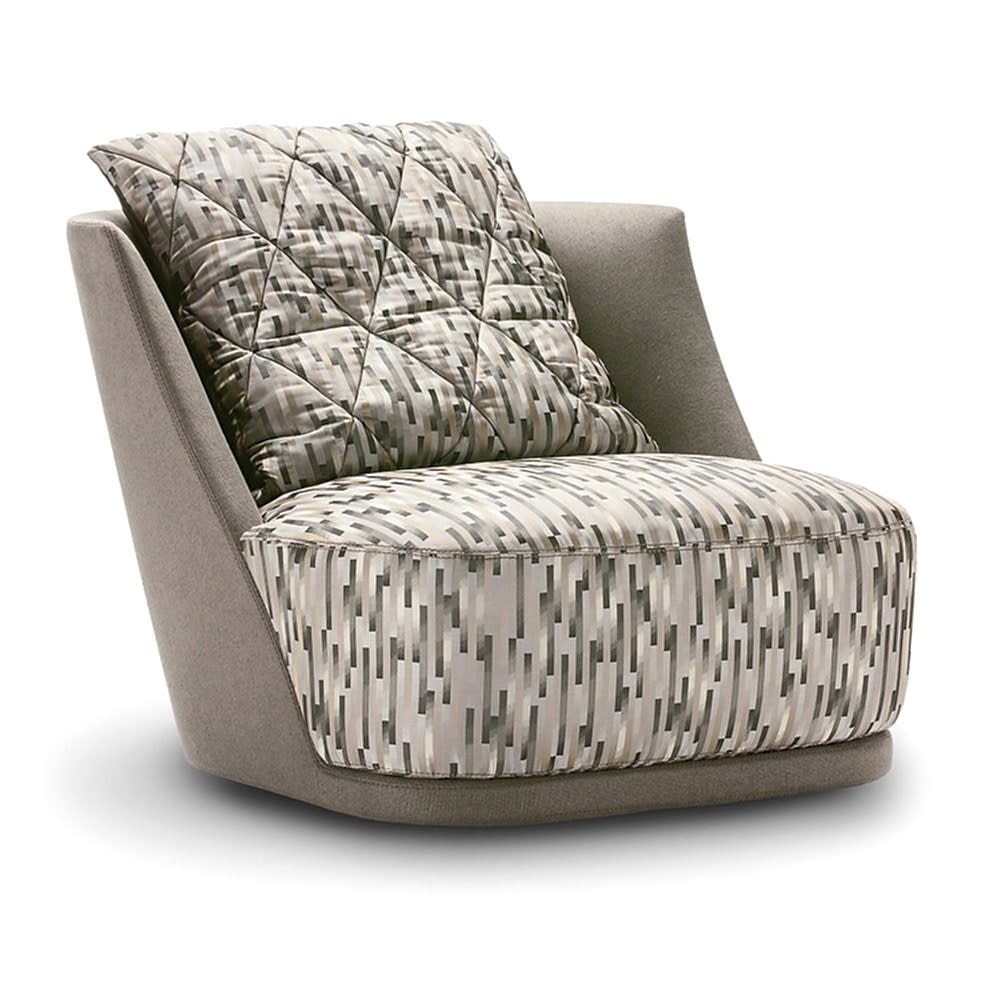 The modern armchair exudes simplicity and elegance with its clean lines and minimalistic design