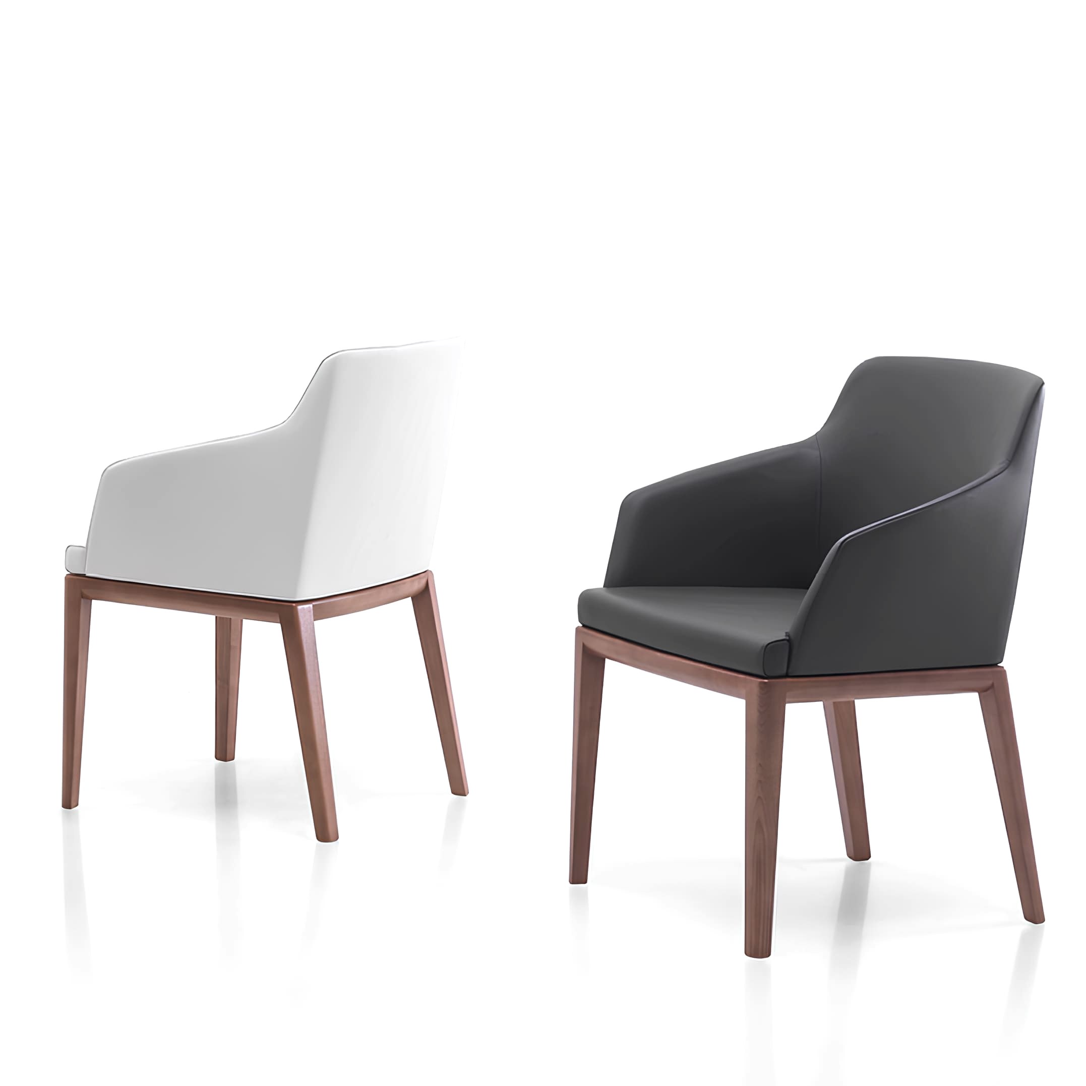 2 chairs with wood frame and sleek fabric seat.