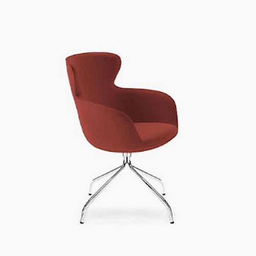 An armchair of spider style base