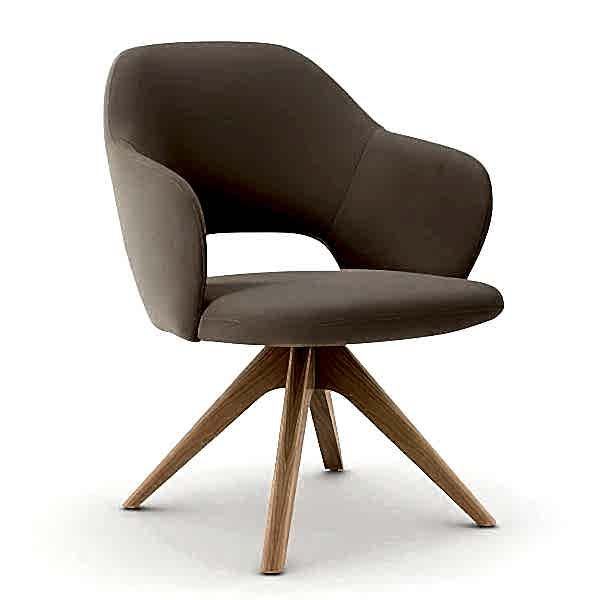 An armchair with fabric upholstery in a light hue
