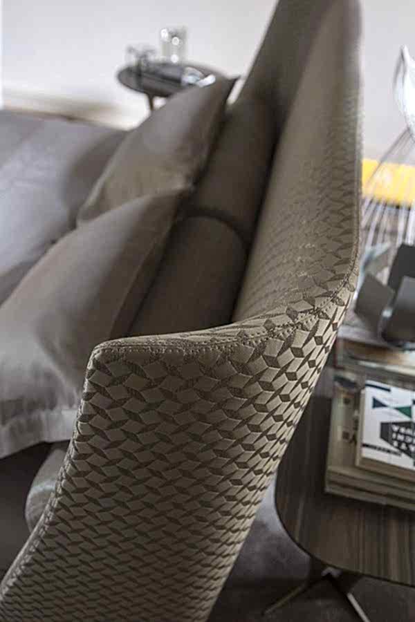 The high headboard of the Serenity Bed provides a cozy and secure feeling, perfect for a peaceful night's sleep