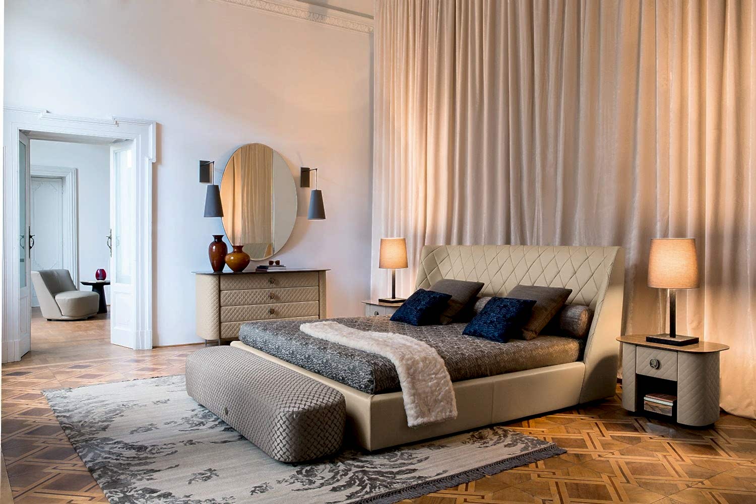 a true masterpiece of design, this large bed features a beautiful diamond-shaped headboard and a sleek, modern base that will elevate any bedroom