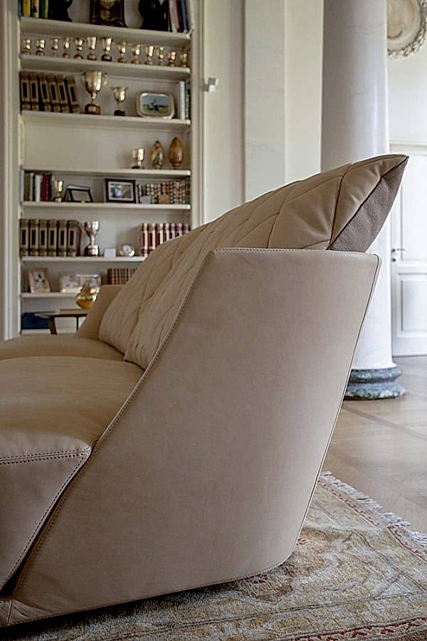 With its clean lines and expertly crafted stitched cushions, this luxury modern sofa is the epitome of modern elegance