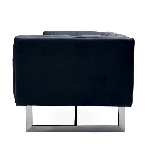Indulge in luxury and sophistication with our modern capitone sofa featuring a chic low back and contemporary metal leg support.
