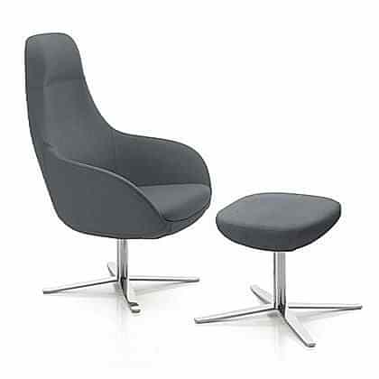 Create a seating oasis with a high back lounge armchair, its supportive legs enhancing both comfort and the overall design.