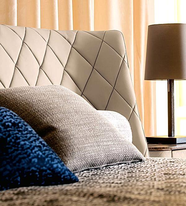 The Diamondback bed - featuring a stunning diamond-stitched headboard and a comfortable, plush mattress, this bed is the epitome of luxury